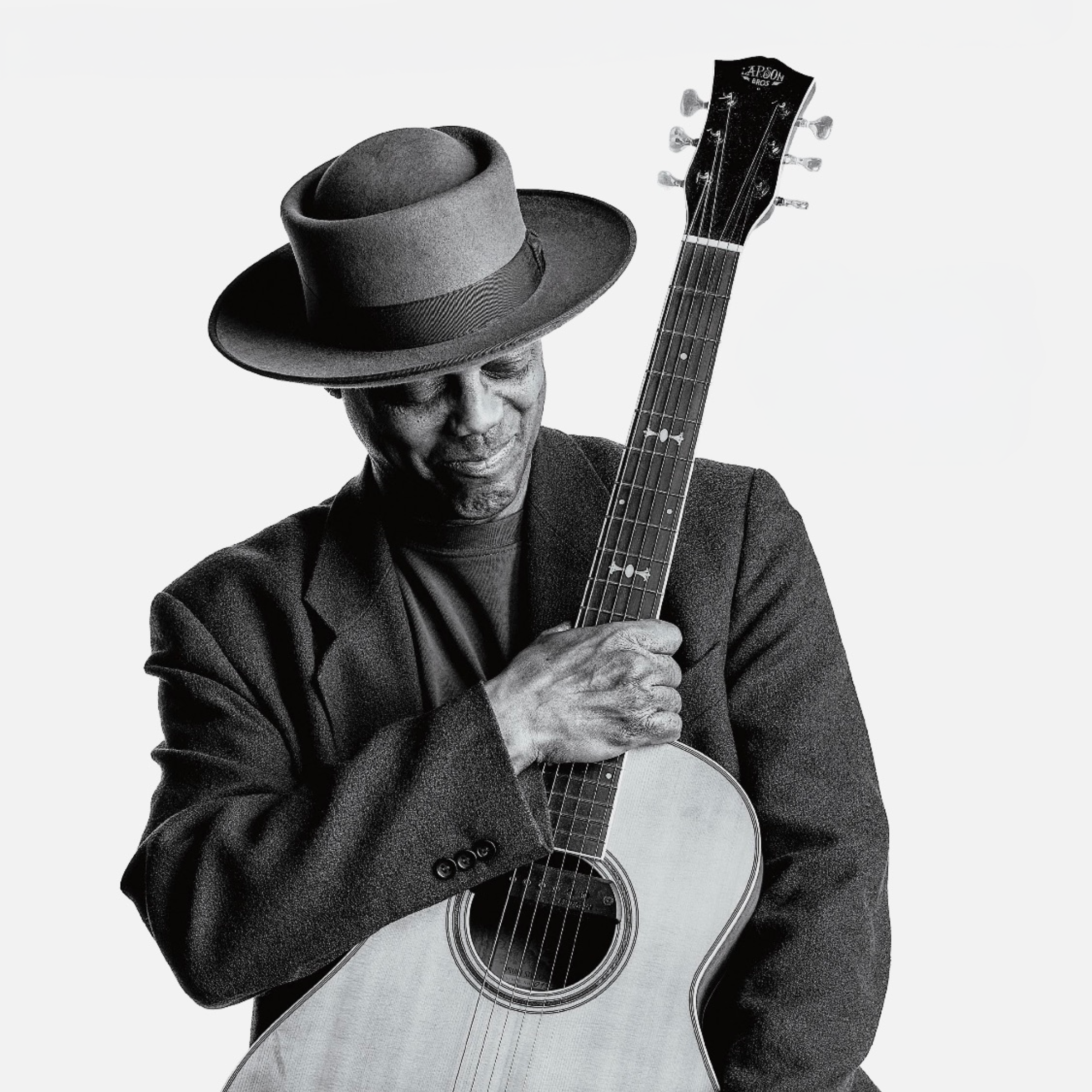 Eric Bibb and Larson Brothers Featured in Guitarist Magazine